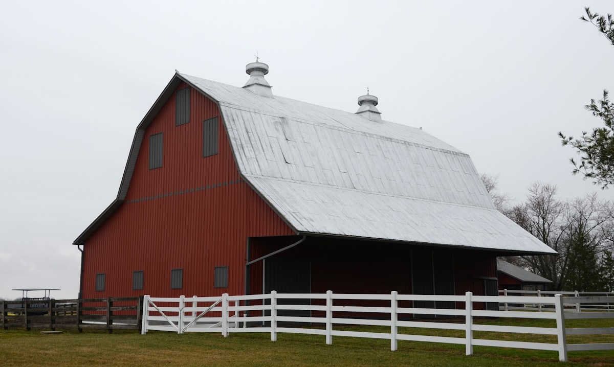 Red barn-style shed with gambrel roof