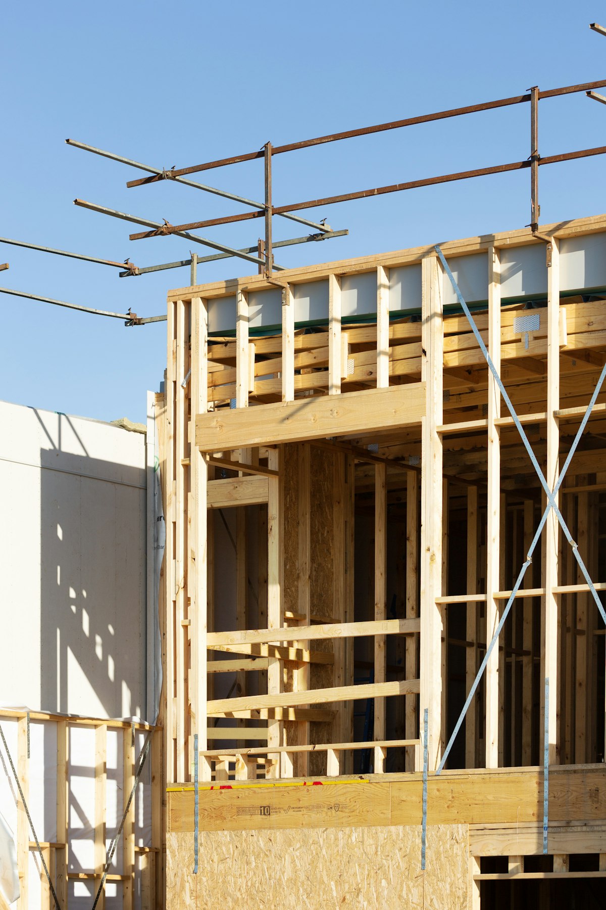 Shed under construction with framing, the point where a building permit applies